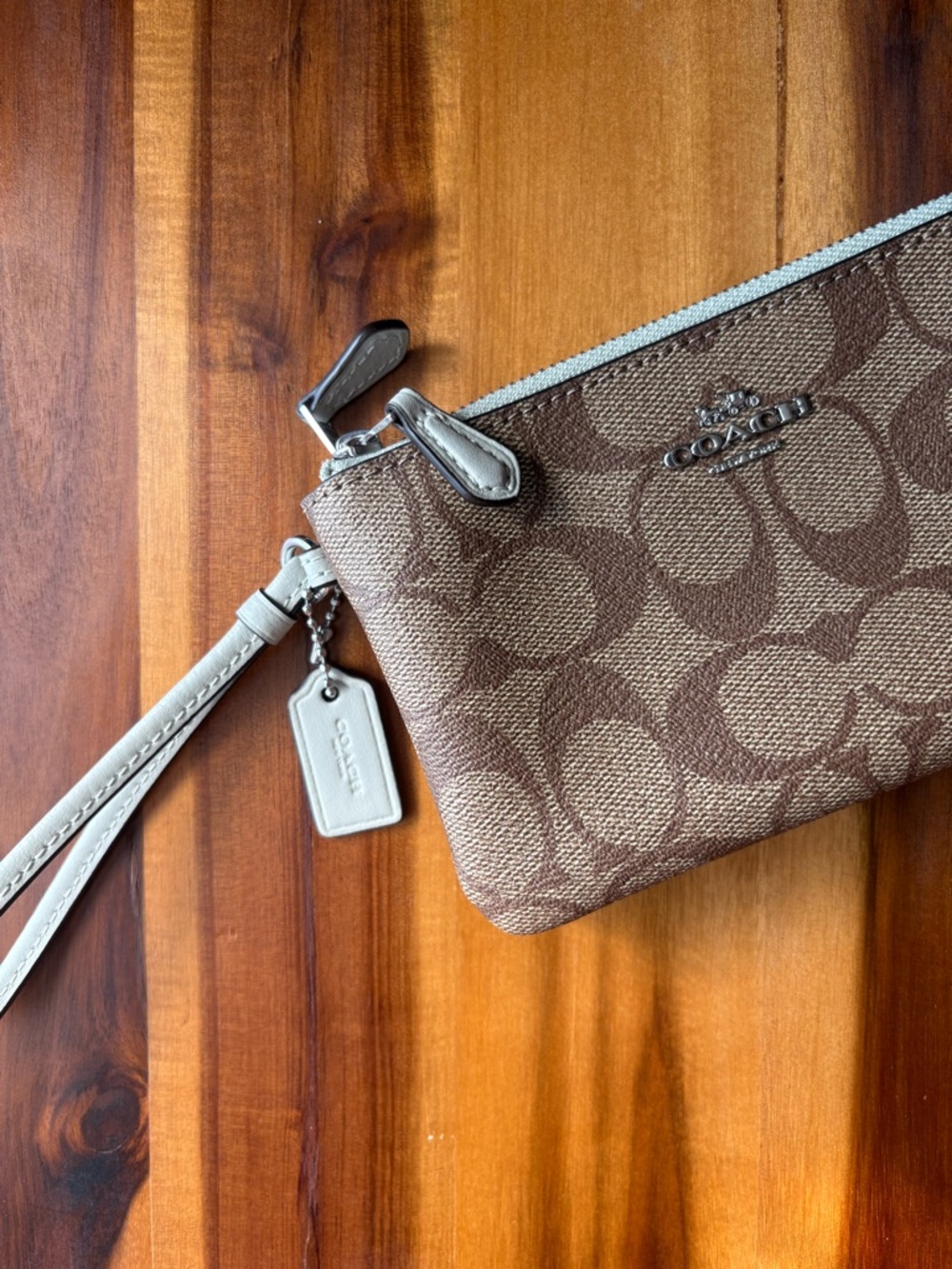 COACH Signature Canvas Corner Double Zip Wristlet in Brown/Tan with Sage Strap